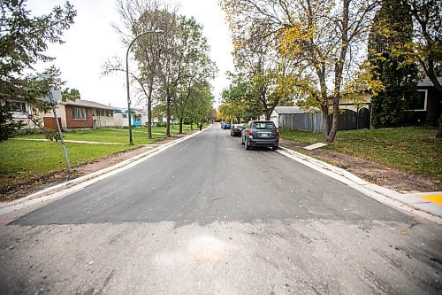 MIKAELA MACKENZIE / FREE PRESS
	
Freshly paved Augusta Drive near Chancellor Drive at the north (Arthur A. Leach Junior High) end on Tuesday, Oct. 1, 2024.

For long-term construction story.
Winnipeg Free Press 2024