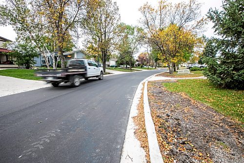 MIKAELA MACKENZIE / FREE PRESS
	
Freshly paved Augusta Drive between Chancellor and Lakeside Drives on Tuesday, Oct. 1, 2024.

For long-term construction story.
Winnipeg Free Press 2024