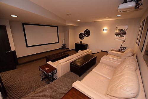 TODD LEWYS / FREE PRESS
A dedicated home theatre with two-tiered seating makes going to the movies a thing of the past.