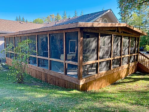 MARC LABOSSIERE / FREE PRESS
Framing of the existing sunroom is adorned with treated lumber to tie-in the new deck build.