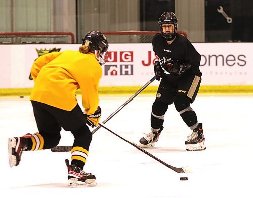 Brandon Wheat Kings blue-liner Haley Blaine and her twin Madison spent last season with the Westman Wildcats but returned home when the new team was announced. She is shown defending at practice earlier this week at J&G Homes Arena as a teammate carries the puck in. (Perry Bergson/The Brandon Sun)
Oct. 3, 2024