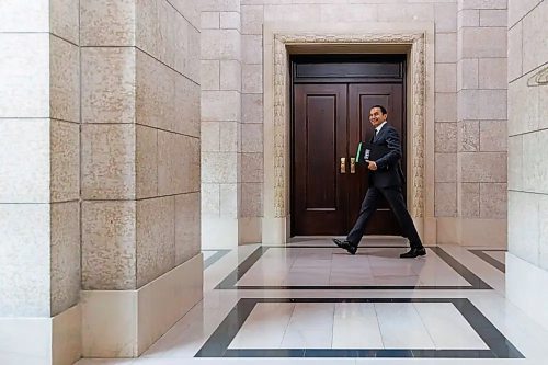 Premier Wab Kinew walks back to his office after question period as the first session of the 43rd Legislature sitting reconvened Wednesday afternoon. The premier opened the session with an apology to Manitoba’s defence lawyers. (Mike Deal/Winnipeg Free Press)