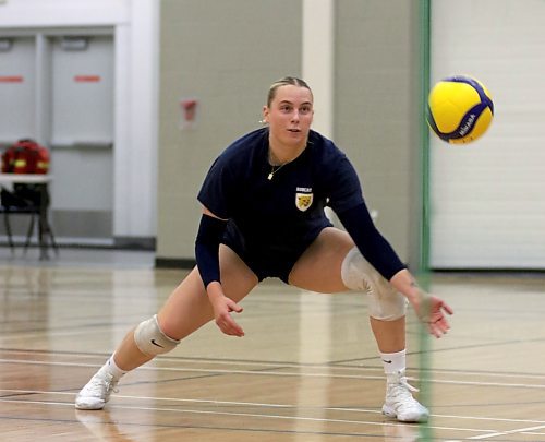 Avery Burgar digs a ball during Brandon University Bobcats women's volleyball practice at the Healthy Living Centre on Wednesday. (Thomas Friesen/The Brandon Sun)