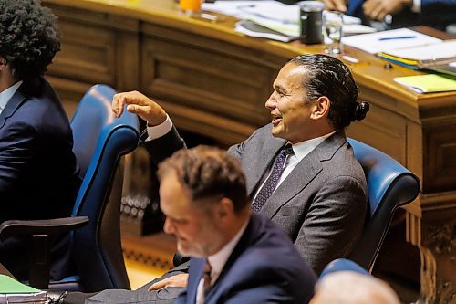 MIKE DEAL / FREE PRESS 
Premier Wab Kinew mimes the pulling of a fire alarm jokingly accusing the opposition of disrupting his answer during question period in the Assembly Chamber as the 1st session of the 43rd Legislature reconvenes Wednesday afternoon.
Reporter: Carol Sanders and Maggie Macintosh
241002 - Wednesday, October 02, 2024.