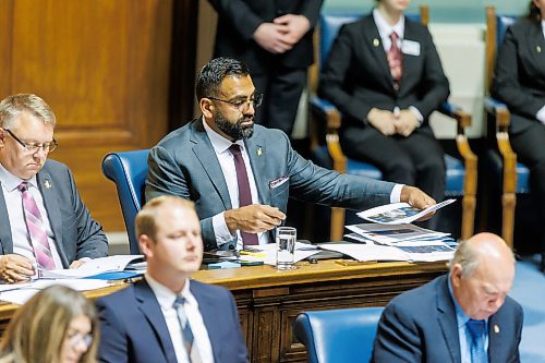 MIKE DEAL / FREE PRESS 
PC MLA (Fort Whyte) Obby Khan goes through papers in the Assembly Chamber as the 1st session of the 43rd Legislature reconvenes Wednesday afternoon.
Reporter: Carol Sanders and Maggie Macintosh
241002 - Wednesday, October 02, 2024.