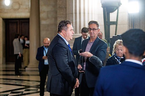 MIKE DEAL / FREE PRESS 
Former NDP, now independent, MLA (Fort Garry), Mark Wasyliw decided to beat Premier Wab Kinew to the media scrum, after question period as the 1st session of the 43rd Legislature reconvenes Wednesday afternoon.
Premier Kinew can be seen in the background deciding to leave for a prior engagement.
Reporter: Carol Sanders and Maggie Macintosh
241002 - Wednesday, October 02, 2024.