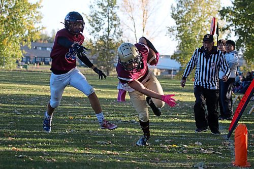 Crocus Plainsmen Cole Klassen dives for the end zone to score the game-winning touchdown in a 21-14 Winnipeg High School Football League victory over the Sturgeon Heights Huskies at Crocus on Thursday. (Thomas Friesen/The Brandon Sun)