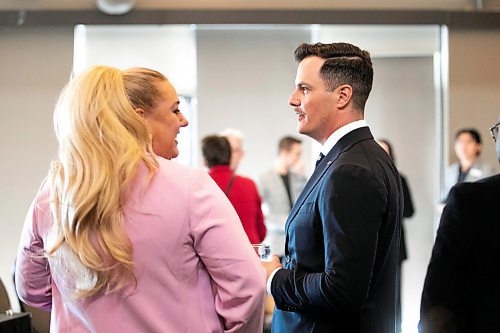 MIKAELA MACKENZIE / FREE PRESS
	
Kevin Selch, founder of Little Brown Jug Brewing Company, and Amanda Buhse, co-founder of Coal and Canary and 2024/2025 incoming board chair, chat at Winnipeg Chamber of Commerce&#x573; Annual General Meeting before Selch is sworn in as the organization&#x573; 2024/2025 board chair on Thursday, Oct. 3, 2024.

For Aaron Epp story.
Winnipeg Free Press 2024