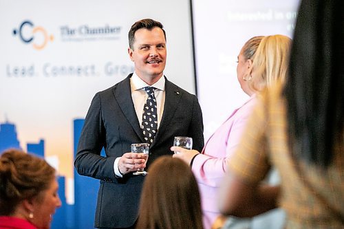 MIKAELA MACKENZIE / FREE PRESS
	
Kevin Selch, founder of Little Brown Jug Brewing Company, and Amanda Buhse, co-founder of Coal and Canary and 2024/2025 incoming board chair, chat at Winnipeg Chamber of Commerce&#x573; Annual General Meeting before Selch is sworn in as the organization&#x573; 2024/2025 board chair on Thursday, Oct. 3, 2024.

For Aaron Epp story.
Winnipeg Free Press 2024