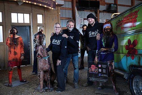 Ruth Bonneville / Free Press

BIZ -  Six Pines Haunted Attractions

Fun family group photo of James and Judy Thevenot, the owner-operators, and their son, Thomas Thevenot, who works at Six Pines and plans to take it over one day.

Subject: Six Pines Haunted Attractions is a 26-year-old haunted house attraction near Stonewall. The attraction receives hundreds of visitors every October who walk through three different haunted houses on the property, which change themes annually.

Story by. Aaron

Oct 3rd , 2023
