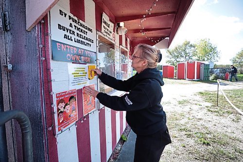 Ruth Bonneville / Free Press

BIZ -  Six Pines Haunted Attractions

Photo of Judy Thevenot  prepping the ticket booth for their opening night Thursday. 

Story on Six Pines Haunted Attractions the Thevenot family, James and Judy Thevenot, the owner-operators, and their son, Thomas Thevenot,  who plans to take over the family business one day.
  
Subject: Six Pines Haunted Attractions is a 26-year-old haunted house attraction near Stonewall. The attraction receives hundreds of visitors every October who walk through three different haunted houses on the property, which change themes annually.

Story by. Aaron

Oct 3rd , 2023
