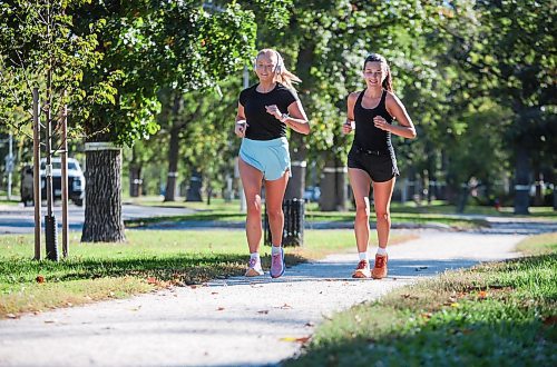 Ruth Bonneville / Free Press

Weather standup - joggers  

Camryn Watson (left - blue shorts) and her friend Tia Davidson decided to take advantage of the beautiful, summer-like weather and go for a 5km run from Assiniboine Park along the Crescent Thursday. 

Sept 26th,  2024