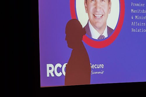 MIKE DEAL / FREE PRESS
Premier Wab Kinew’s distinctive silhouette is cast onto a screen as he arrives to speak to about 400 attendees at the Retail Crime Summit that was held at the RBC Convention Centre Friday.
Reporter: Nicole Buffie
241004 - Friday, October 04, 2024.