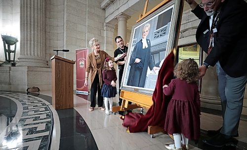 Ruth Bonneville / Free Press

LOCAL STDUP - speaker portrait

Myrna Driedger, 30th speaker of the Manitoba Legislative Assembly unveils her portrait with the help of her two granddaughters, Addison (almost 6yrs, red bow) and her sister Briar (3yrs, blue bow), at a special ceremony in the Rotunda at the Legislative Building Friday. 

Topic: Unveiling ceremony for the official portrait ofMyrna Driedger, the 30th speaker of theManitoba Legislative Assembly

Who: Tom Lindsey, 31st speaker of the ManitobaLegislative Assembly helped with the unveiling.  


Oct 4th , 2023
