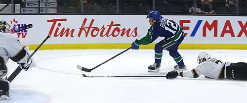 Swift Current Broncos forward Rylan Gould (12) charges toward the Brandon Wheat Kings net as defenceman Charlie Elick (7) dives and goalie Ethan Eskit (50) awaits a shot during Western Hockey League action at Westoba Place on Saturday. Elick was able to break up the play.  (Perry Bergson/The Brandon Sun)
Oct. 5, 2024