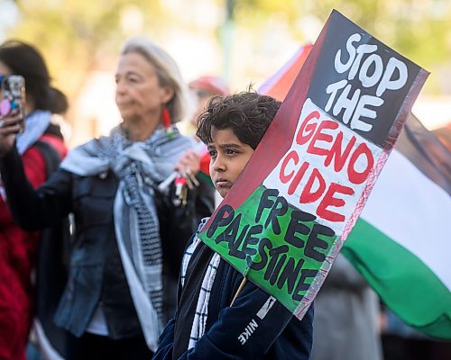 Mike Sudoma/Free Press
A young pro Palestinian holds a sign during a pro Palestinian rally at the Manitoba Legislative Grounds Saturday afternoon 
October 5, 2024
