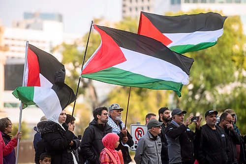 Mike Sudoma/Free Press
Palestinian flags fly as hundreds of pro Palestinian protesters rally at the Manitoba Legislative Grounds Saturday afternoon 
October 5, 2024
