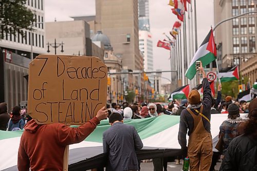 Mike Sudoma/Free Press
Pro Palestinian protesters young and old rally at the Portage and Main St intersection after marching from the Manitoba Legislature Saturday afternoon 
October 5, 2024
