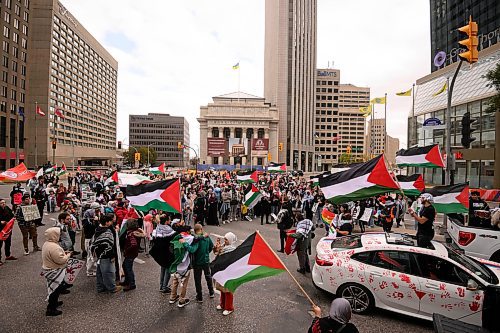 Mike Sudoma/Free Press
Pro Palestinian protesters young and old rally at the Portage and Main St intersection after marching from the Manitoba Legislature Saturday afternoon 
October 5, 2024
