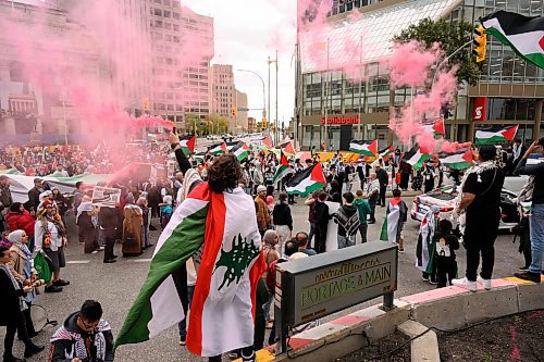 Mike Sudoma/Free Press
Pro Palestinian protesters young and old rally at the Portage and Main St intersection after marching from the Manitoba Legislature Saturday afternoon 
October 5, 2024
