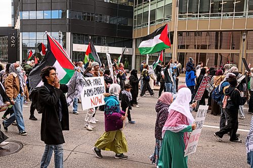 Mike Sudoma/Free Press
Saturdays pro Palestinian rally marches down Main Street towards the intersection of Portage and Main after a prior rally at the Manitoba Legislature 
October 5, 2024
