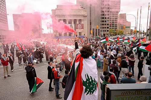 Mike Sudoma/Free Press
Pro Palestinian protesters young and old rally at the Portage and Main St intersection after marching from the Manitoba Legislature Saturday afternoon 
October 5, 2024
