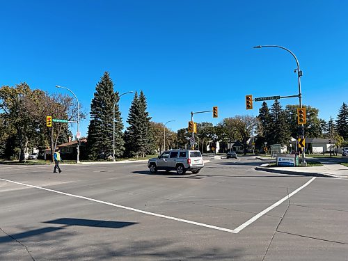 (Tyler Searle / Free Press) 
Cadets direct traffic during a power outage at Cambridge Street and Corydon Avenue Sunday.