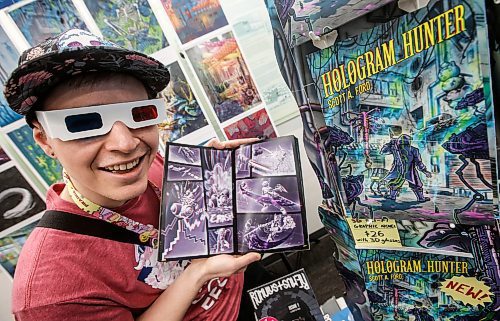 JOHN WOODS / WINNIPEG FREE PRESS
Comic artist Scott Ford shows off his latest 3D graphic novel at the Prairie Comics Festival in the Winnipeg Millennium Library in Winnipeg Sunday, October 6, 2024. 

Reporter: ?