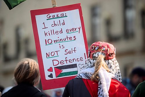 Mike Sudoma/Free Press
Pro Palestinian protesters hold signs and fly Palestinian flags during a rally at the Manitoba Legislative Grounds Saturday afternoon 
October 5, 2024
