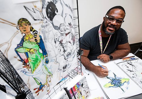 JOHN WOODS / WINNIPEG FREE PRESS
Comic artist Matthew Welch works on a piece during the Prairie Comics Festival at the Winnipeg Millennium Library in Winnipeg Sunday, October 6, 2024. 

Reporter: ?