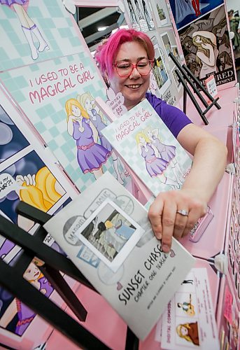 JOHN WOODS / WINNIPEG FREE PRESS
Comic artist Stephanie Guest sets her creation in place at her booth at the Prairie Comics Festival in the Winnipeg Millennium Library in Winnipeg Sunday, October 6, 2024. 

Reporter: ?