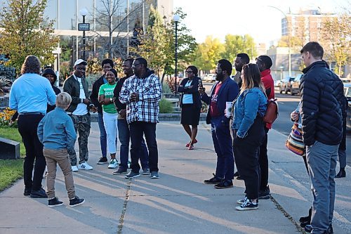 Brandon Mayor Jeff Fawcett and some members of the Nigerian community based in Brandon take a picture after the flag raising event at the City Hall on Monday morning. (Abiola Odutola/The Brandon Sun)