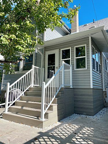 Marc LaBossiere / Free Press
A screened back porch replaces and old and decrepit staircase. 