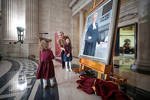 Ruth Bonneville / Free Press

LOCAL STDUP - speaker portrait

Myrna Driedger, 30th speaker of the Manitoba Legislative Assembly unveils her portrait with the help of her two granddaughters, Addison (almost 6yrs, red bow) and her sister Briar (3yrs, blue bow), at a special ceremony in the Rotunda at the Legislative Building Friday. 

Topic: Unveiling ceremony for the official portrait ofMyrna Driedger, the 30th speaker of theManitoba Legislative Assembly

Who: Tom Lindsey, 31st speaker of the ManitobaLegislative Assembly helped with the unveiling.  


Oct 4th , 2023
