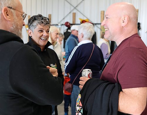 Killarney's mayor Janice Smith (middle) shares a laugh with Dr. Dominic Hennessy (right) and local restaurant owner Rick Pauls (left) at a recent fundraising event in the community. (Michele McDougall/The Brandon Sun)  