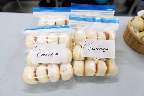 MIKE DEAL / FREE PRESS
Packaged buns for customers who have made orders.
Deb Rogalsky, founder of Deb's Meat Buns, runs her home-based enterprise out of a commercial kitchen attached to her home in Landmark, Manitoba. 
She bakes as many as 300 dozen meat buns a week.
She turns out over a dozen varieties of meat buns, or perishky, including pulled pork, buffalo chicken and taco - as well as one called the Original (ground beef, onions, mashed potatoes) based on a recipe developed by Deb's mom, decades ago. 
Reporter: Dave Sanderson
241009 - Wednesday, October 09, 2024.