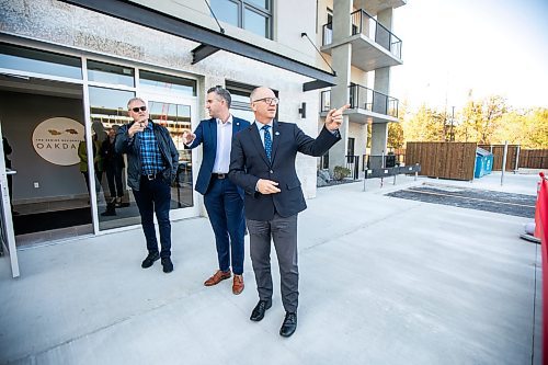 MIKAELA MACKENZIE / FREE PRESS
	
Developer Keith Merkel (left), councillor Evan Duncan, and mayor Scott Gillingham take a look at construction at the new Oakdale Seniors Residence opening on Wednesday, Oct. 9, 2024.

For Joyanne story.
Winnipeg Free Press 2024