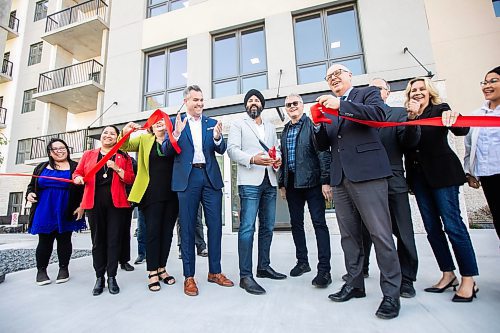 MIKAELA MACKENZIE / FREE PRESS
	
Developers Jas Kalar (centre left) and Keith Merkel (centre right) cut the ribbon at the new Oakdale Seniors Residence opening on Wednesday, Oct. 9, 2024.

For Joyanne story.
Winnipeg Free Press 2024