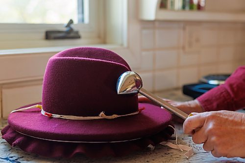 MIKE DEAL / FREE PRESS
Kelly Bekeris, Milliner, shows how she uses her egg iron on a fedora hat that is under construction.
When Kelly Bekeris retired from teaching, she found herself with plenty of time on her hands. Already an accomplished seamstress, she started making mittens, from merino wool which she sourced from vintage jumpers. Deciding to challenge herself even further, the 72-year-old ventured into millinery. She&#x2019;s yet-to-regret that decision and has made around 300 hats since she started in 2019. 
Reporter: AV Kitching
241009 - Wednesday, October 09, 2024.