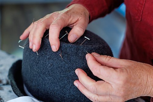 MIKE DEAL / FREE PRESS
Kelly Bekeris, Milliner, pulls out pins that she uses when creating her Sculpted Freeform wool hats.
When Kelly Bekeris retired from teaching, she found herself with plenty of time on her hands. Already an accomplished seamstress, she started making mittens, from merino wool which she sourced from vintage jumpers. Deciding to challenge herself even further, the 72-year-old ventured into millinery. She&#x2019;s yet-to-regret that decision and has made around 300 hats since she started in 2019. 
Reporter: AV Kitching
241009 - Wednesday, October 09, 2024.