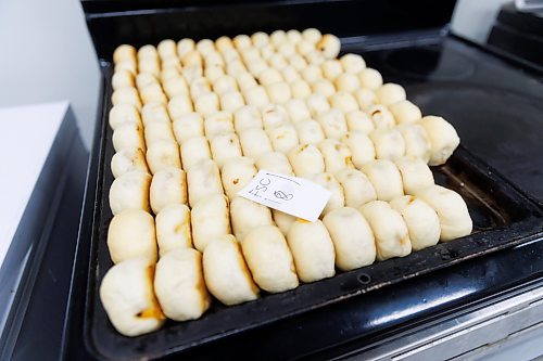 MIKE DEAL / FREE PRESS
Buns wait to be packaged up.
Deb Rogalsky, founder of Deb's Meat Buns, runs her home-based enterprise out of a commercial kitchen attached to her home in Landmark, Manitoba. 
She bakes as many as 300 dozen meat buns a week.
She turns out over a dozen varieties of meat buns, or perishky, including pulled pork, buffalo chicken and taco - as well as one called the Original (ground beef, onions, mashed potatoes) based on a recipe developed by Deb's mom, decades ago. 
Reporter: Dave Sanderson
241009 - Wednesday, October 09, 2024.