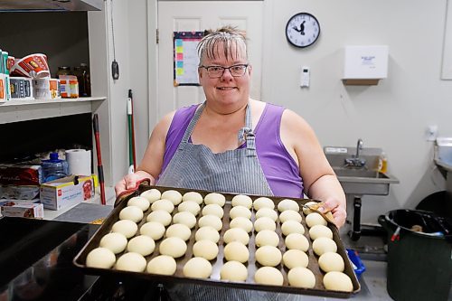 MIKE DEAL / FREE PRESS
Buns fresh out of the oven.
Deb Rogalsky, founder of Deb's Meat Buns, runs her home-based enterprise out of a commercial kitchen attached to her home in Landmark, Manitoba. 
She bakes as many as 300 dozen meat buns a week.
She turns out over a dozen varieties of meat buns, or perishky, including pulled pork, buffalo chicken and taco - as well as one called the Original (ground beef, onions, mashed potatoes) based on a recipe developed by Deb's mom, decades ago. 
Reporter: Dave Sanderson
241009 - Wednesday, October 09, 2024.