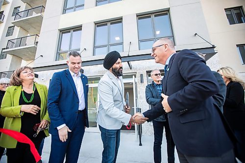 MIKAELA MACKENZIE / FREE PRESS
	
Mayor Scott Gillingham (right) shakes hands with developer Jas Kalar at the new Oakdale Seniors Residence opening on Wednesday, Oct. 9, 2024.

For Joyanne story.
Winnipeg Free Press 2024