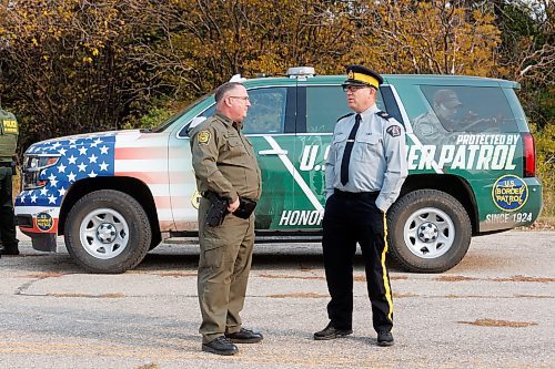 MIKE DEAL / FREE PRESS
Sergeant Lance Goldau (right), head of the Manitoba RCMP&#x2019;s Integrated Border Enforcement Team and U.S. Chief Border Patrol Agent Scott Garrett speak during a show-and-tell of some specialized equipment at the old border crossing in Emerson, MB, Thursday morning.
Manitoba RCMP officers and agents from United States Border Patrol met first in Pembina, North Dakota and then at Emerson, MB, Thursday morning, to talk about border safety and showcase some of the equipment used in preventing border incursions.
Reporter: Erik Pindera
241010 - Thursday, October 10, 2024.