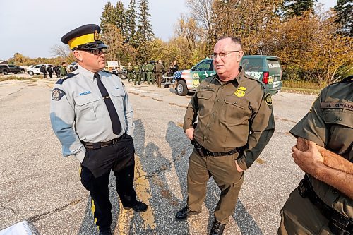 MIKE DEAL / FREE PRESS
Sergeant Lance Goldau (left), head of the Manitoba RCMP&#x2019;s Integrated Border Enforcement Team and U.S. Chief Border Patrol Agent Scott Garrett speak during a show-and-tell of some specialized equipment at the old border crossing in Emerson, MB, Thursday morning.
Manitoba RCMP officers and agents from United States Border Patrol met first in Pembina, North Dakota and then at Emerson, MB, Thursday morning, to talk about border safety and showcase some of the equipment used in preventing border incursions.
Reporter: Erik Pindera
241010 - Thursday, October 10, 2024.