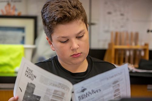 BROOK JONES / FREE PRESS
Grade 8 STEM Option student Reed Moran is pictured reaching the mission goals problem solving sheets at &#xc9;cole Stonewall Centennial School in Stonewall, Man., Thursday, Oct. 10, 2024. STEM 8 Option students particpate in the Canadian Space Agency's Rover Driving Academy with the company's mission control. Student teams were able to command via a remote computer accesss program a rover on a simulated lunar surface that the Canaidan Space Agency is developing in Longueil, Que., to go to the moon's surface.