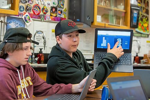 BROOK JONES / FREE PRESS
Grade 8 STEM Option students Grayson Levesque left) and Cash Tataryn are pictured at &#xc9;cole Stonewall Centennial School in Stonewall, Man., Thursday, Oct. 10, 2024. STEM 8 Option students particpate in the Canadian Space Agency's Rover Driving Academy with the company's mission control. Student teams were able to command via a remote computer accesss program a rover on a simulated lunar surface that the Canaidan Space Agency is developing in Longueil, Que., to go to the moon's surface.