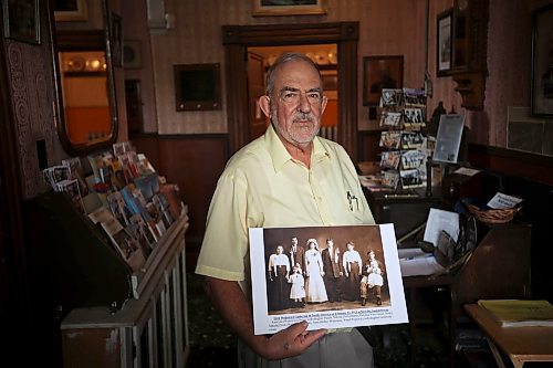 10102024
Frank Cedar of Ottawa holds a historical photo of his Polish family in Melville, Saskatchewan in 1913, at the Daly House Museum on Thursday. Cedar has an exhibition of the history of the Brandon Polish Community in photos opening at the Daly House in mid November. The exhibit will feature photos from Poland, Brandon and Melville. 
(Tim Smith/The Brandon Sun)
