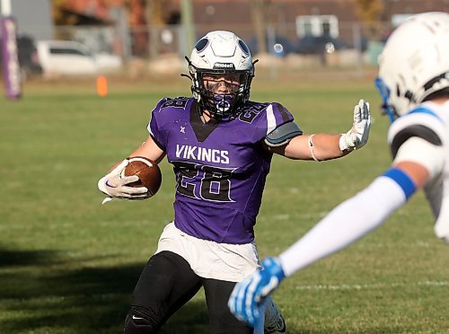 Brayden Smith of the Vincent Massey Vikings runs the ball against the River East Kodiaks in WHSFL action at Doug Steeves Field on a beautiful Friday afternoon. (Tim Smith/The Brandon Sun)