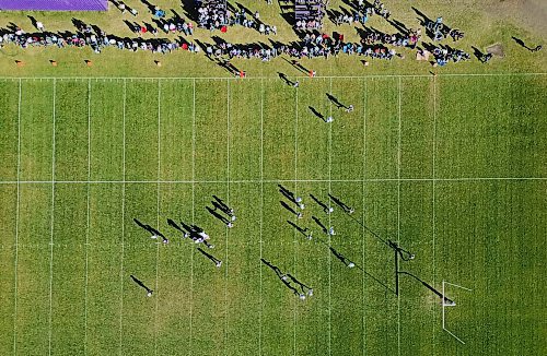 The Vincent Massey Vikings and the River East Kodiaks cast shadows as they go head-to-head in Massey's last WHSFL home game. (Tim Smith/The Brandon Sun)